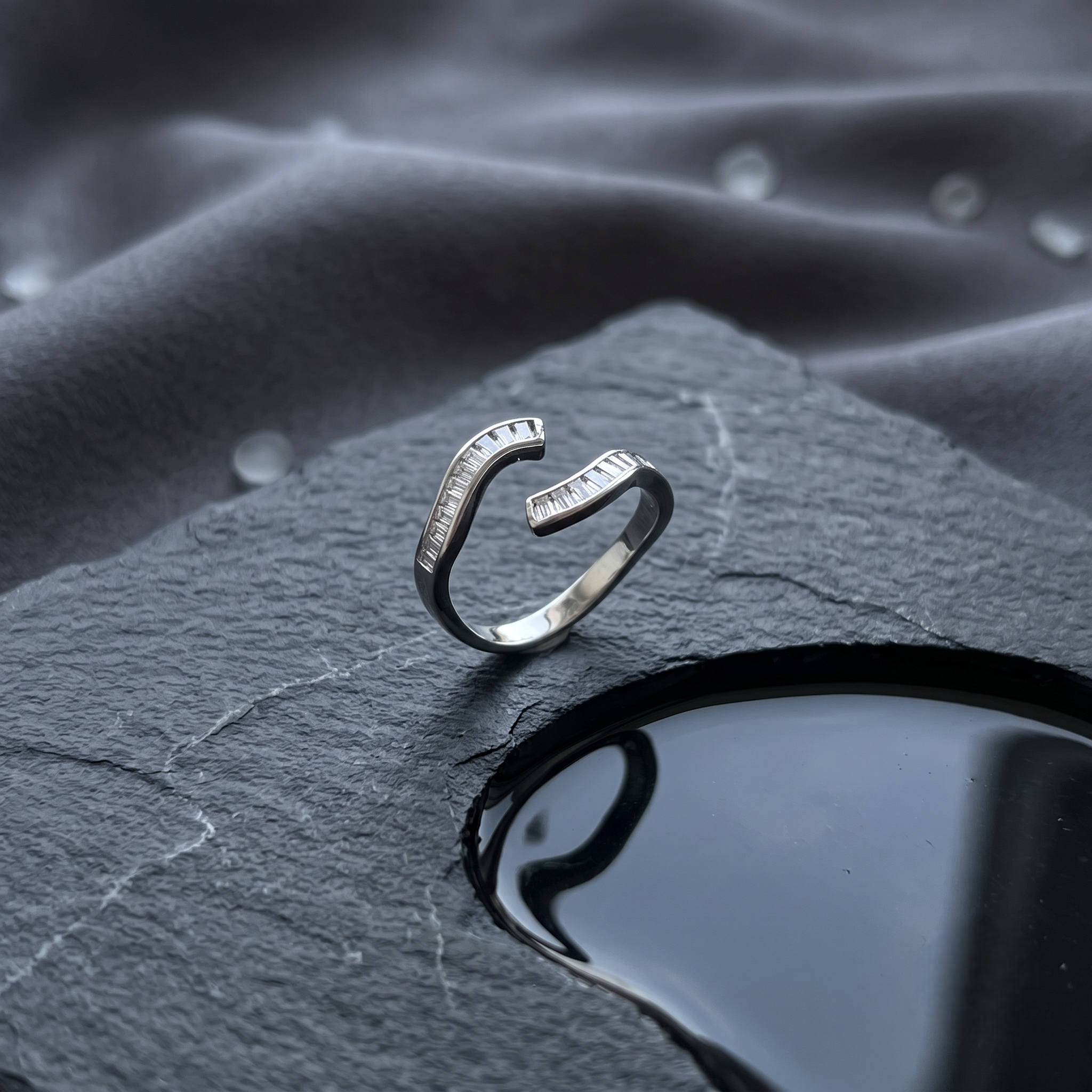 925 Sterling Silver Open Ring with Curved Baguette Cut CZ Stones.