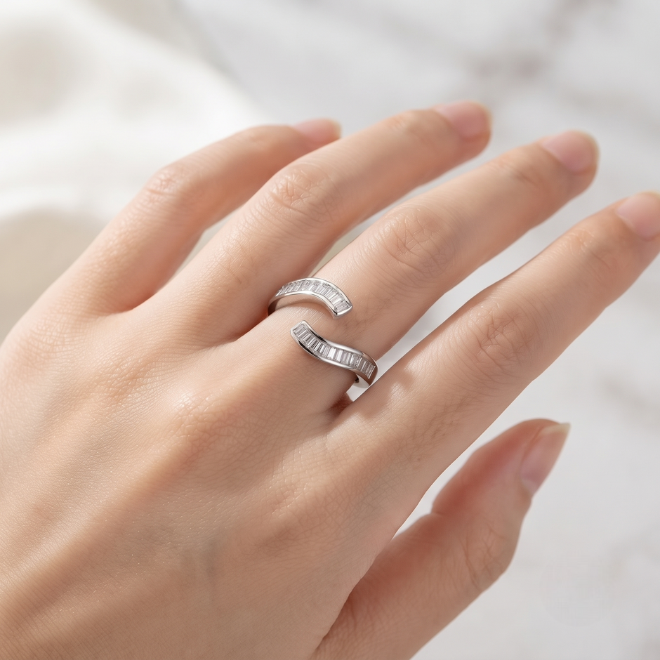 925 Sterling Silver Open Ring with Curved Baguette Cut CZ Stones.