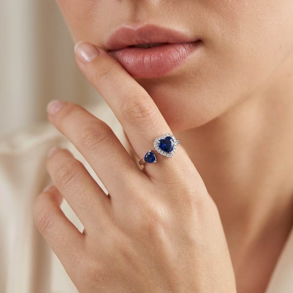 925 Sterling Silver Open Heart Ring with Blue CZ and Clear Halo Accent.