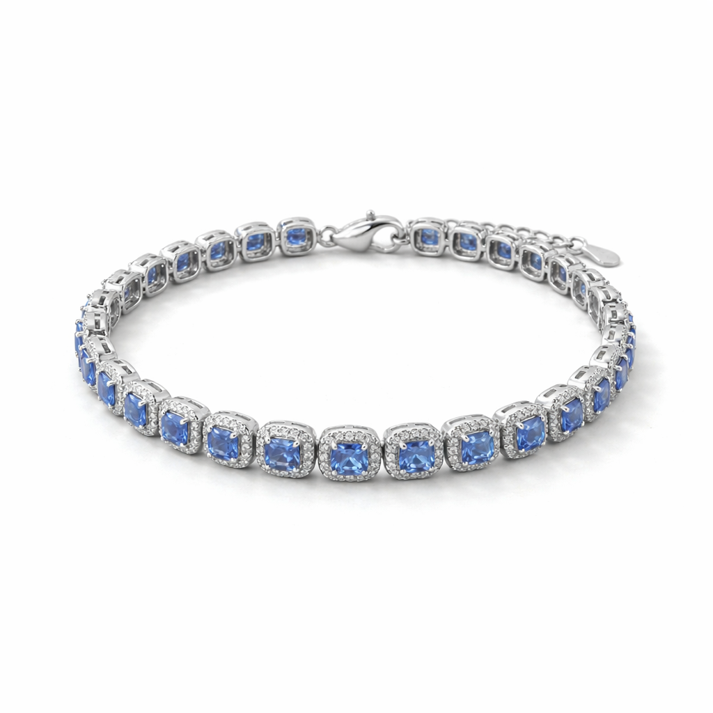 Silver bracelet with blue gemstones on a white background