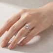 925 Sterling Silver Pear Cut CZ Open Ring with Round Accent Stones.