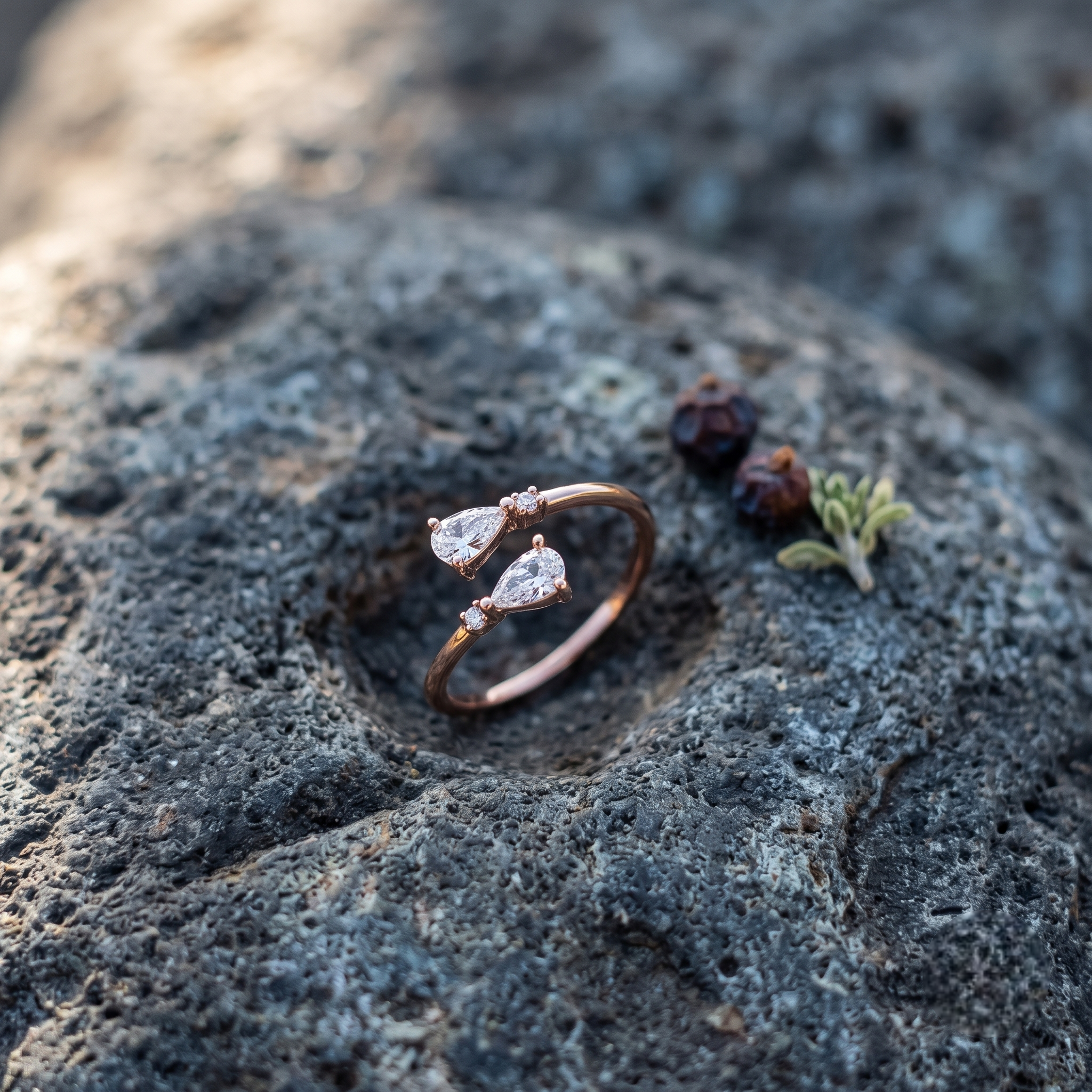 925 Sterling Silver Rose Gold Open Ring with Dual Pear Cut CZ Stones and Round Accents on Natural Stone.