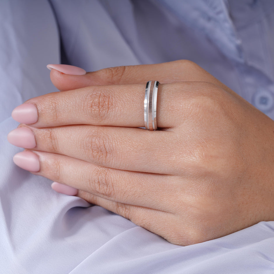 Elegant Dual Tone Diamond Texture Ring on Hand