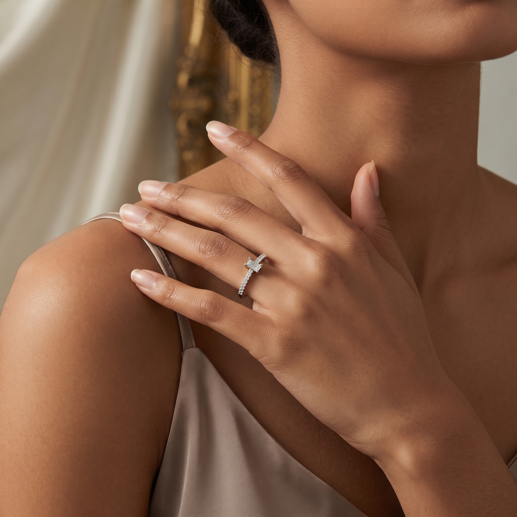 925 Sterling Silver Emerald Cut Solitaire CZ Ring with Pavé Band on Black Stone Display