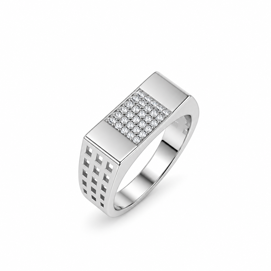Silver ring with a rectangular stone-studded face and square lattice cutout band.