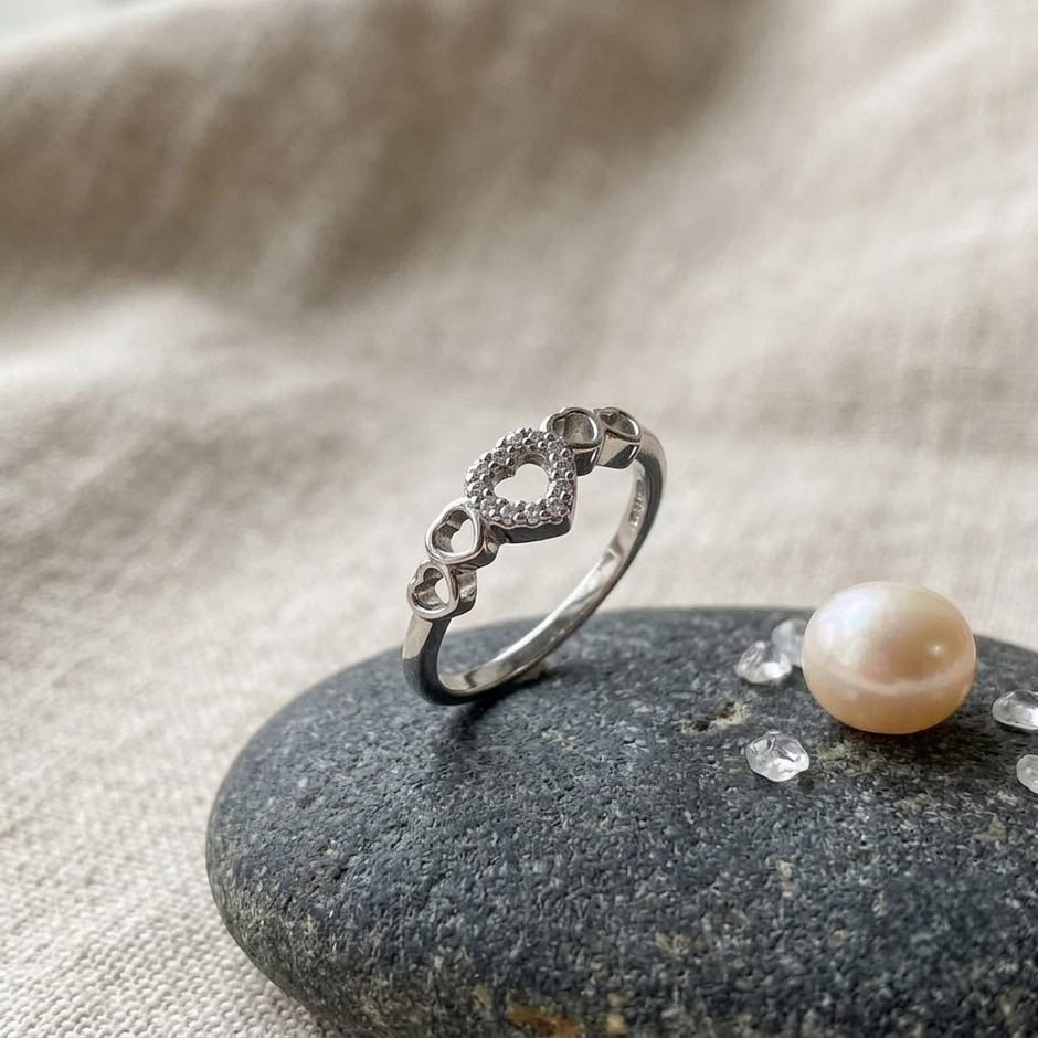 925 Sterling Silver Open Heart CZ Ring with Triple Heart Accents.