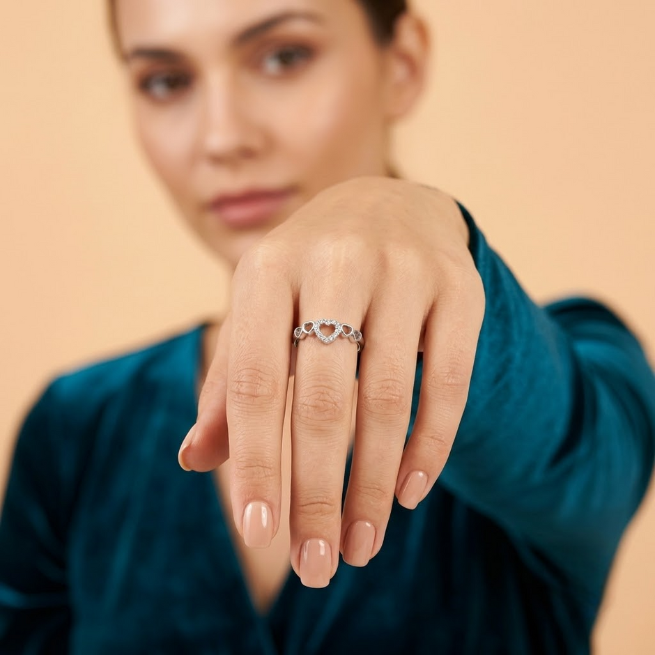 925 Sterling Silver Open Heart CZ Ring with Triple Heart Accents.