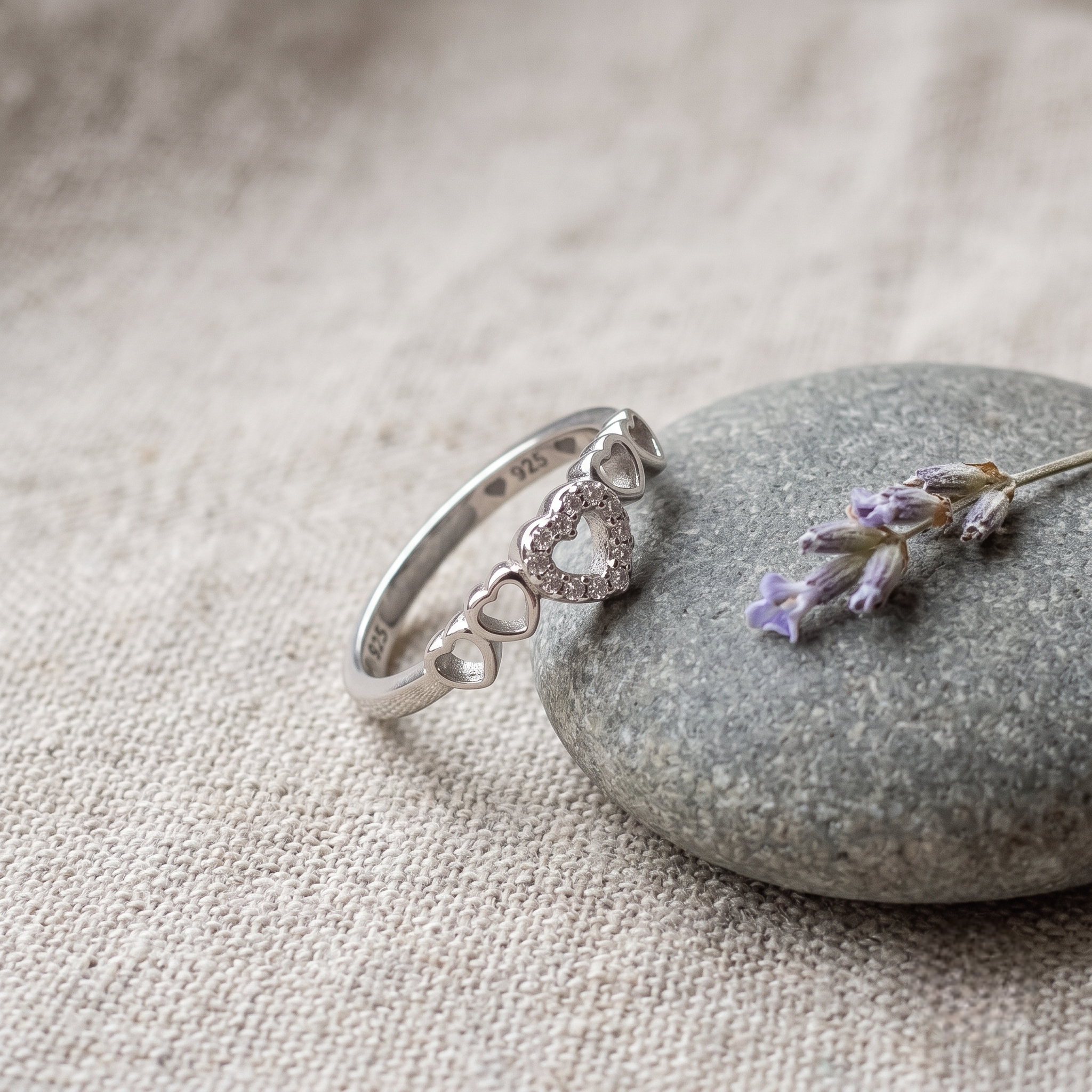 925 Sterling Silver Open Heart CZ Ring with Triple Heart Accents.