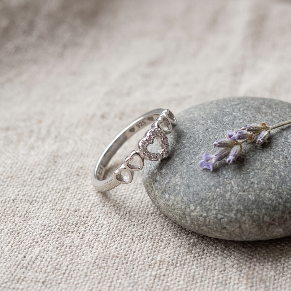 925 Sterling Silver Open Heart CZ Ring with Triple Heart Accents.