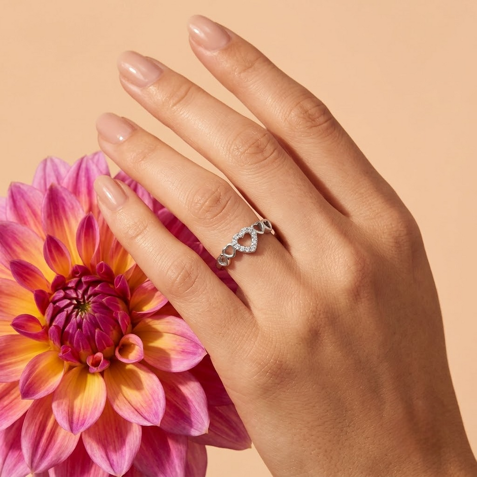 925 Sterling Silver Open Heart CZ Ring with Triple Heart Accents.