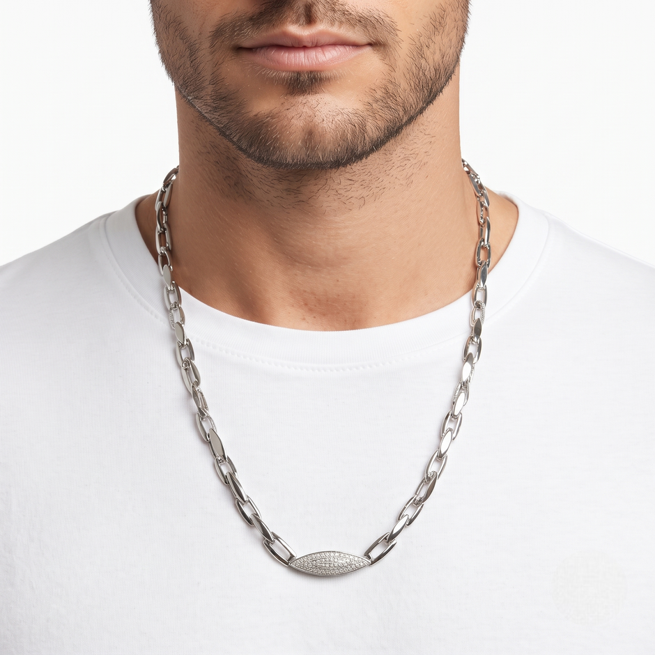 Silver paperclip chain with an oval stone-studded centrepiece 