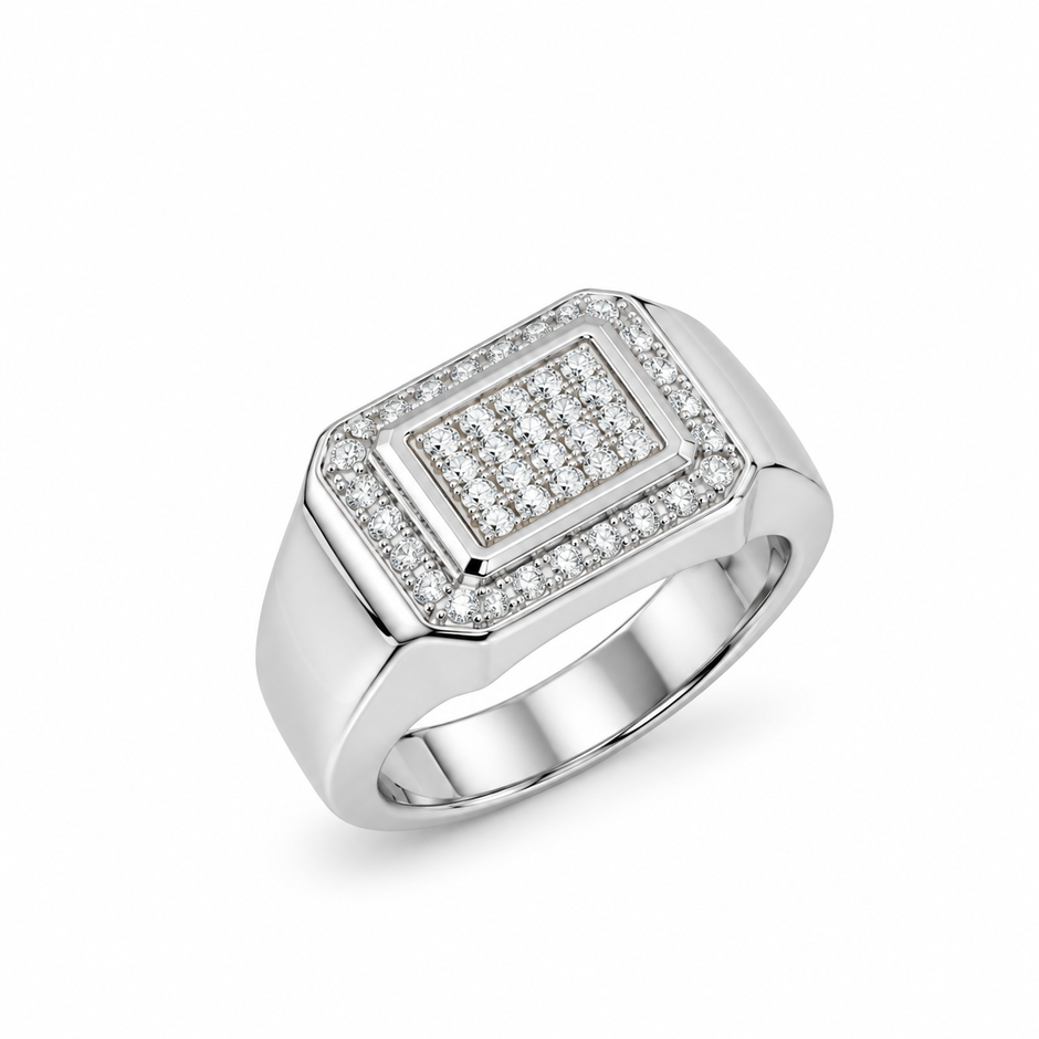 Silver ring with a square pavé-set centre, stone-studded halo and wide polished band.