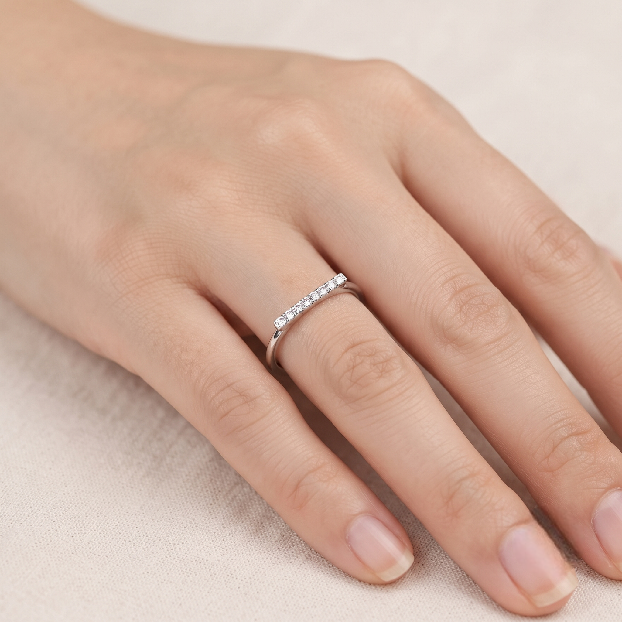 925 Sterling Silver Pavé CZ Band Ring on Blue Slate Surface