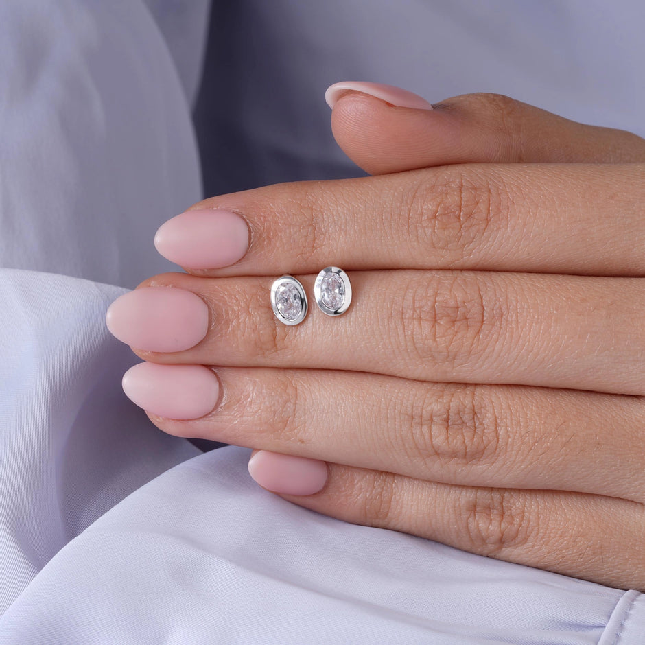 Oval Cut Diamond Round Stud Earrings