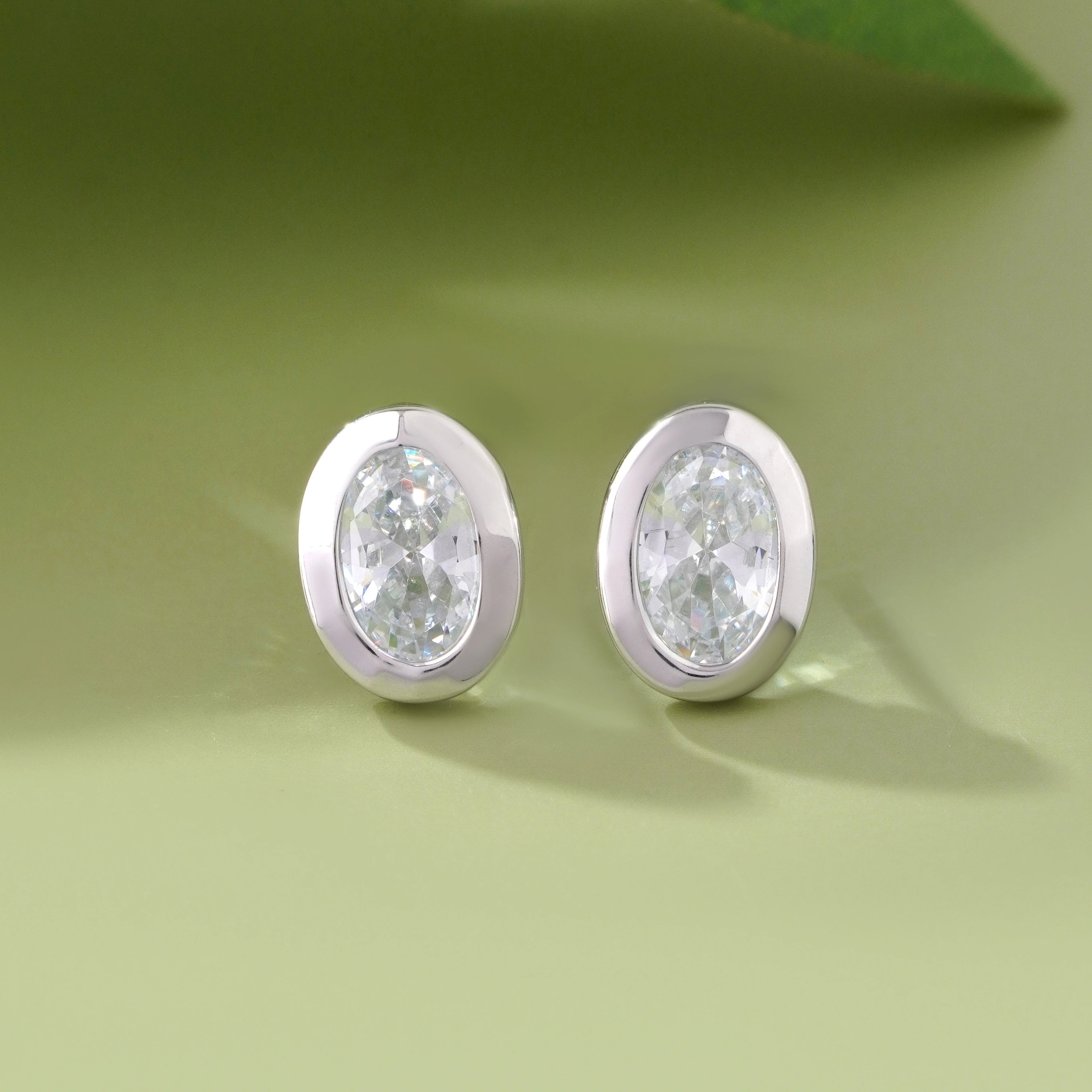 Oval Cut Diamond Round Stud Earrings