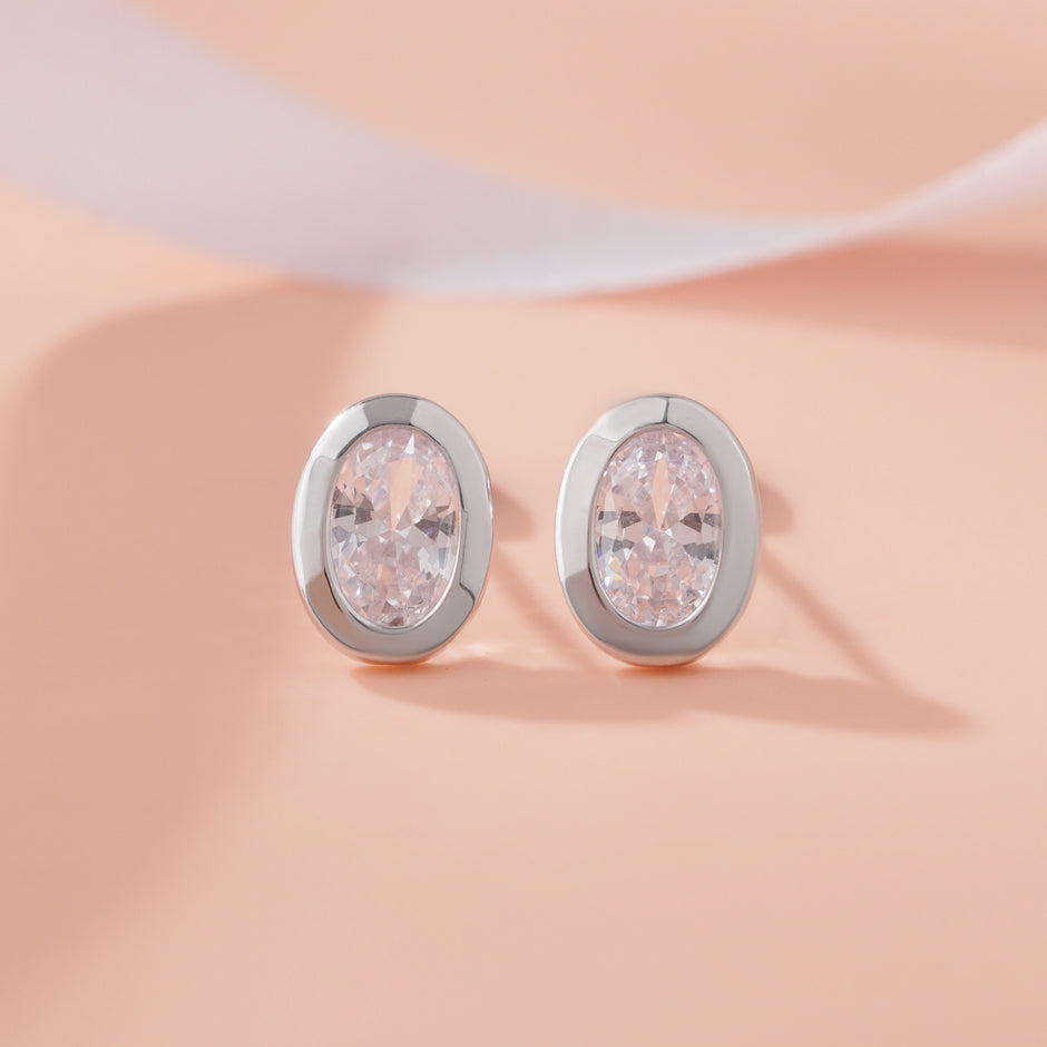 Oval Cut Diamond Round Stud Earrings