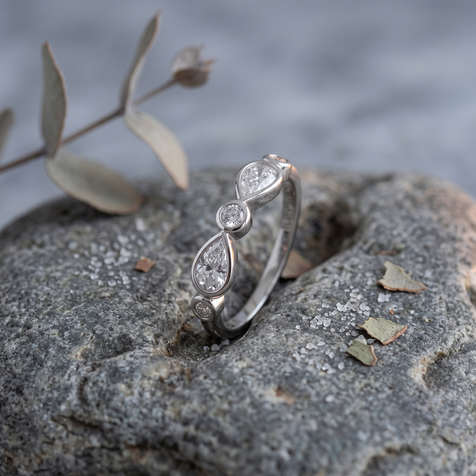 925 Sterling Silver Bezel-Set Pear and Round CZ Band Ring.