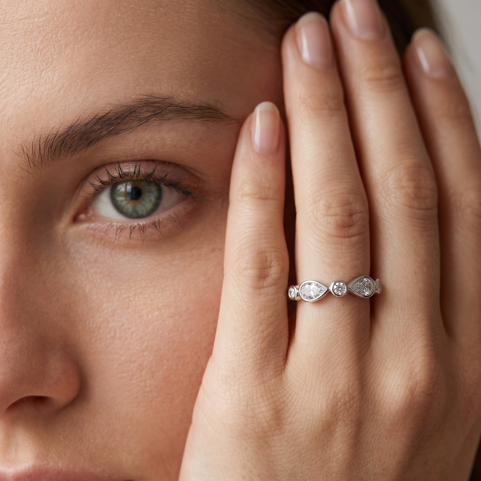925 Sterling Silver Bezel-Set Pear and Round CZ Band Ring.