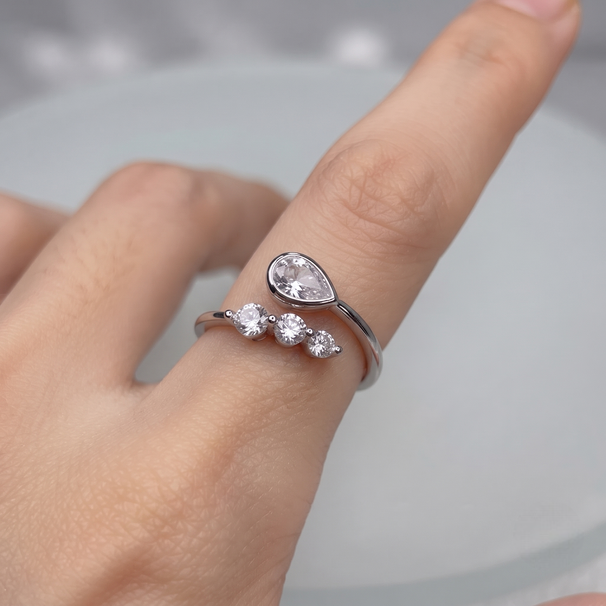 925 Sterling Silver Pear & Round CZ Adjustable Open Ring.