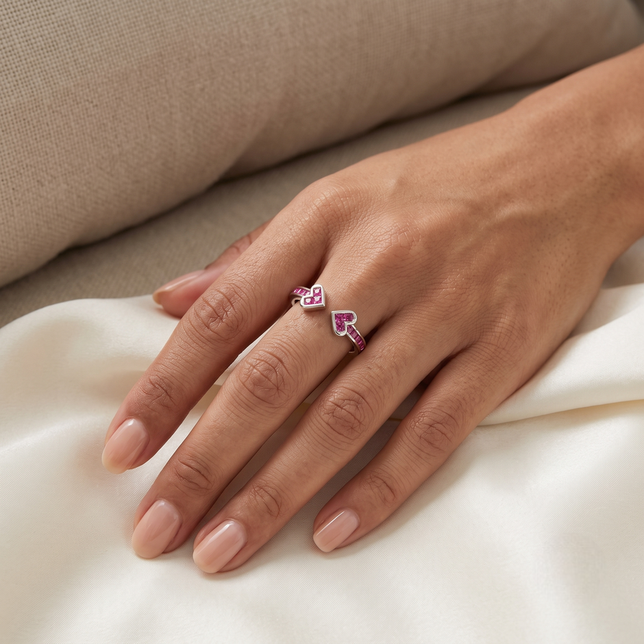 925 Sterling Silver Open Heart Ruby CZ Adjustable Ring on Natural Stone with Red Roses.