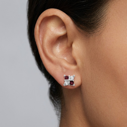 925 Sterling Silver Red & White CZ Butterfly Stud Earrings for Women on Soft Floral Background