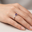 925 Sterling Silver Open Ring with Purple Pear-Cut CZ and Clear Round CZ.