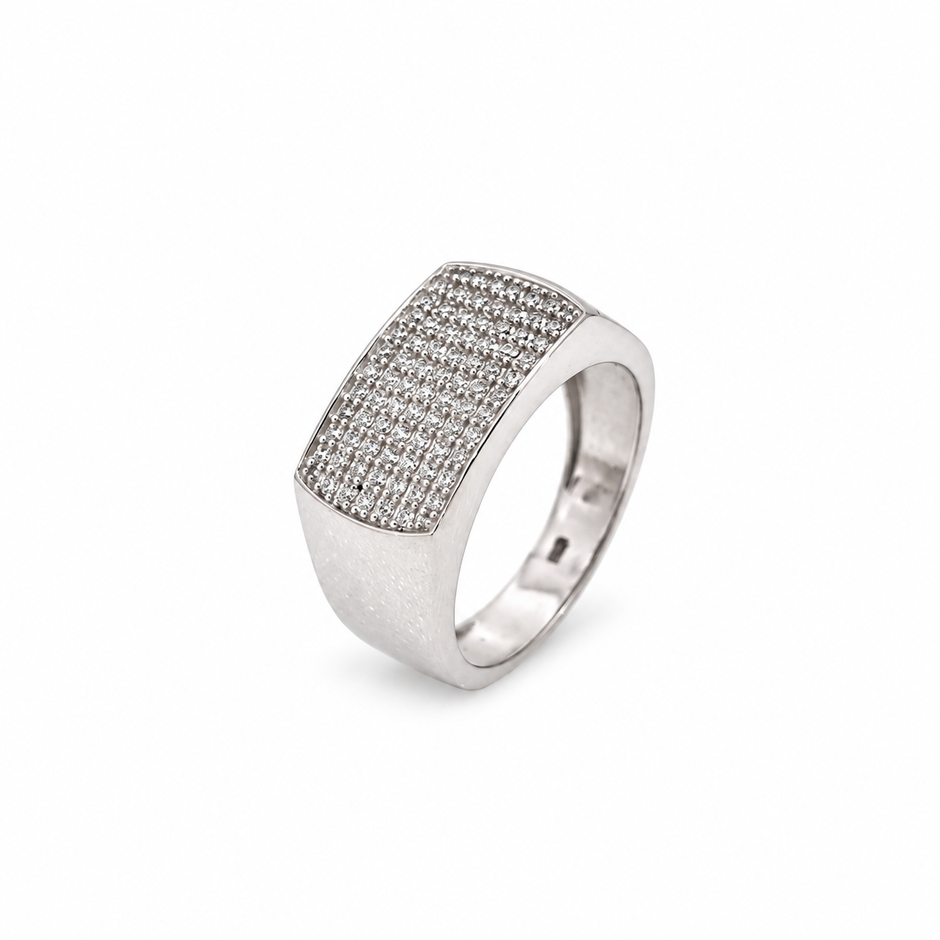 Silver ring with a broad rectangular pavé-set face and polished band.