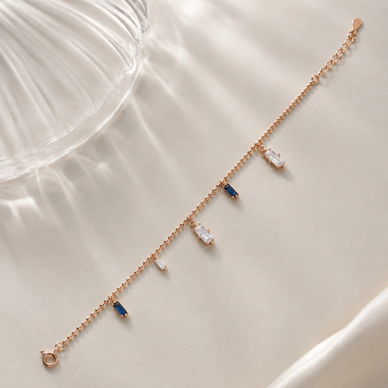 Rose gold 925 sterling silver bracelet with blue and white stones for women
