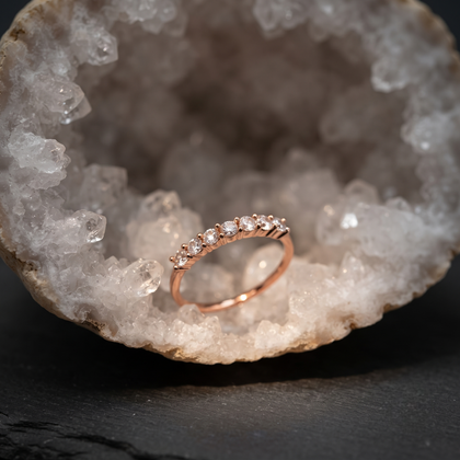 925 Sterling Silver Rose Gold Half Eternity CZ Band Ring on Gray Stone.