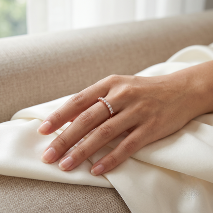 925 Sterling Silver Rose Gold Half Eternity CZ Band Ring on Gray Stone.
