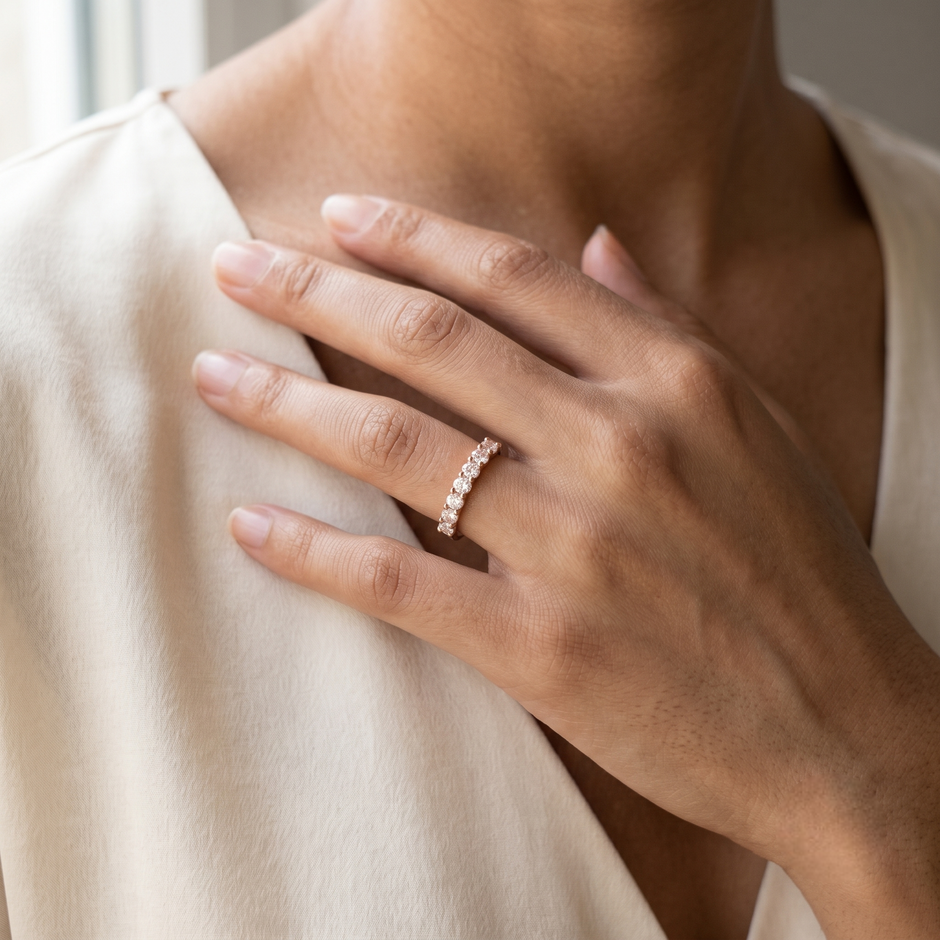 925 Sterling Silver Rose Gold Half Eternity CZ Band Ring on Gray Stone.