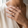 925 Sterling Silver Rose Gold Half Eternity CZ Band Ring on Gray Stone.