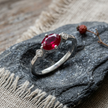 925 Sterling Silver Oval Ruby CZ Solitaire Ring with Side Accent Stones.