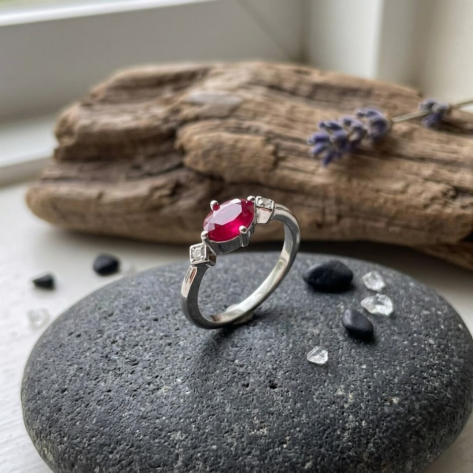 925 Sterling Silver Oval Ruby CZ Solitaire Ring with Side Accent Stones.