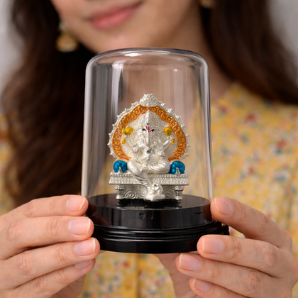 Silver Ganesh devotional murti elegant glass dome home decor