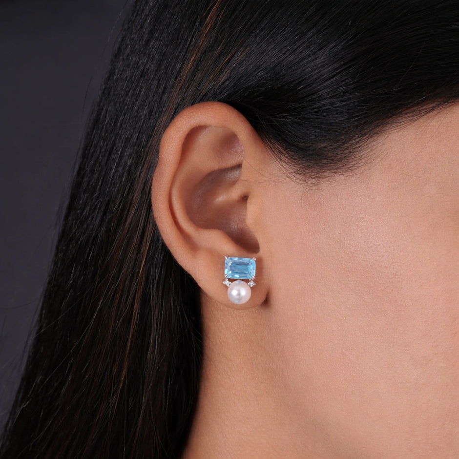 Sky Blue Emerald Cut Diamond Stud Earrings