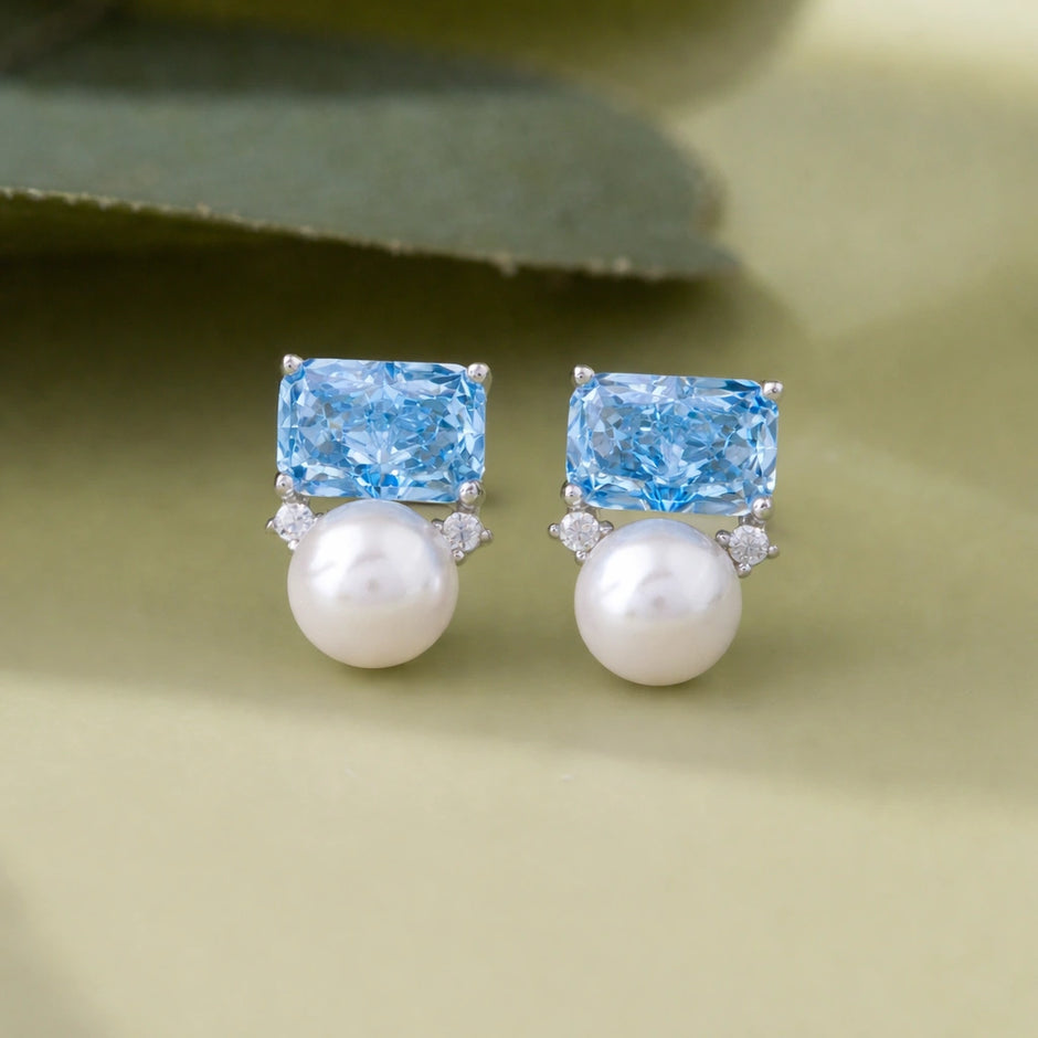 Sky Blue Emerald Cut Diamond Stud Earrings