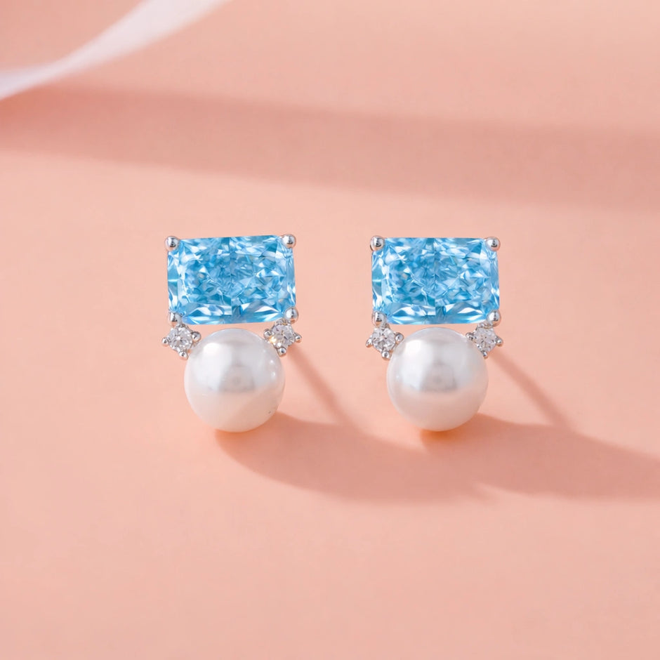 Sky Blue Emerald Cut Diamond Stud Earrings
