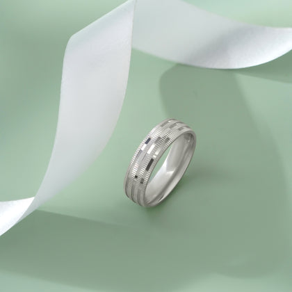 Sleek Diamond Cut Silver Band Ring on Hand