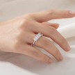 925 Sterling Silver Three-Stone Emerald Cut Cubic Zirconia Ring for Women on Black Stone Display