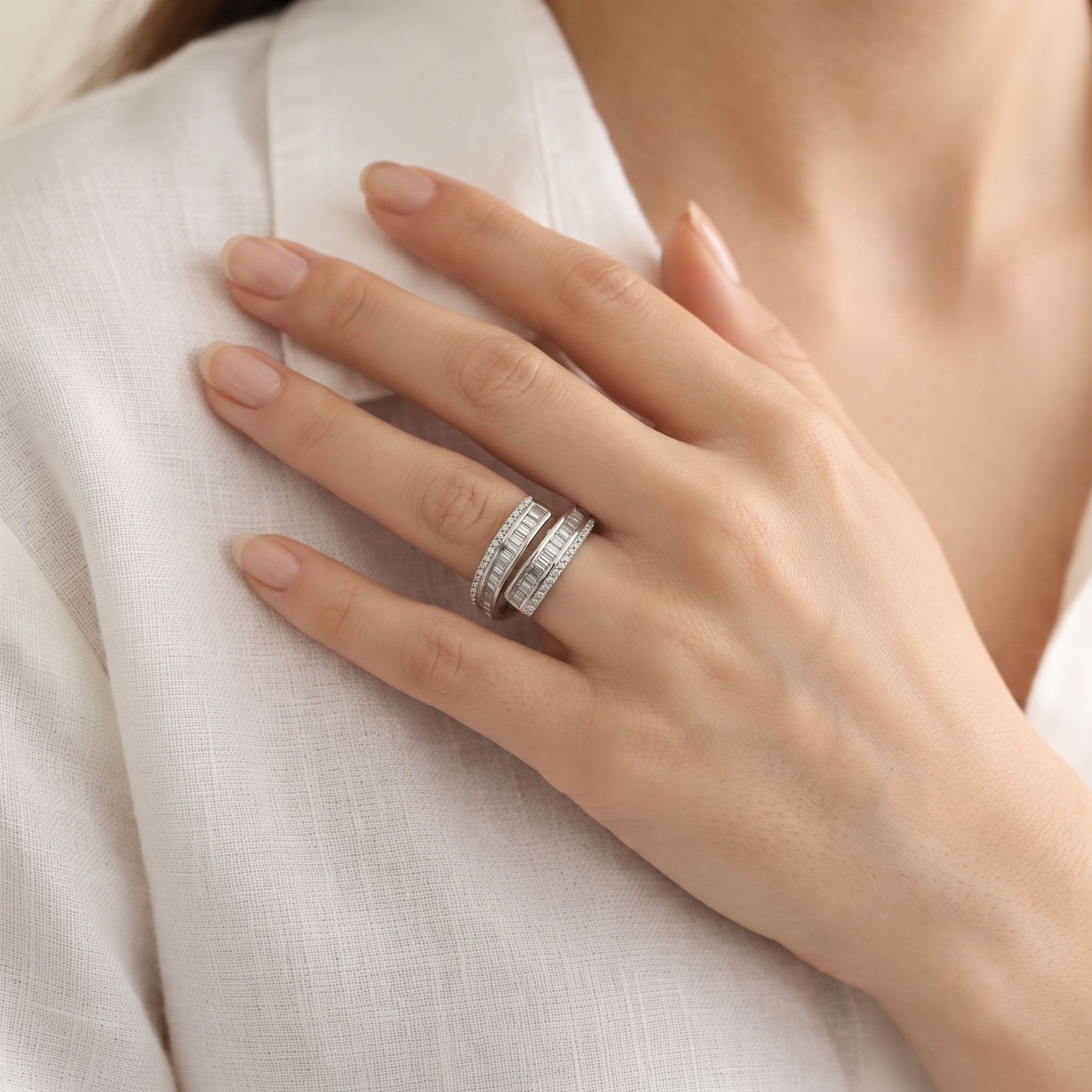 925 Sterling Silver Wrap Ring with Baguette and Pavé Cubic Zirconia on White Marble Display